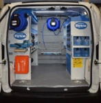 A van fitted with a cable winder and hose winder