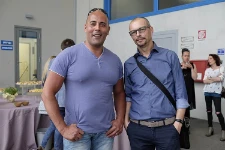 Adamo Comunello and an employee during the celebrations