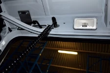 Close-up of a socket in a commercial vehicle operated by a shop refurbishing business serving small, medium and large stores