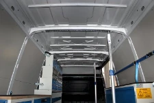 Daily cargo ceiling with load lock poles