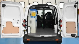 Shelves and plastic containers in a 2014 Ford Courier