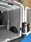 The plywood floor liner and steel sheet bodywork liners
