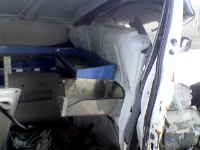 The racking on the right of the damaged van
