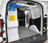 Right side of the fitted-out Courier with shelving, pockets, cable holder and floor panel