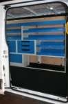 Shelving and drawer components on the left-hand side of the Transit