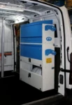 Shelving in a Syncro van upfit for sheet metal machine technicians