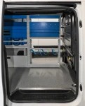 Shelving in the Vivaro seen through the side door