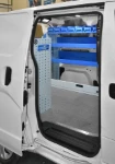 Shelving on the Nissan NV200 seen from the side door