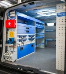 Shelving with closed compartments, cases, drawers and vice holder in the Fiat Talento