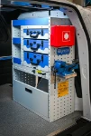 Shelving with vice holder, cases, shelves and fold-down door for the Citan