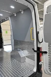 Side view of the MAN TGE's cargo area with anti-slip aluminium lining