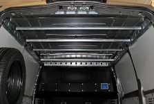Syncroblock rails for hanging garment bars mounted on the van cargo-area ceiling