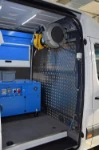 The compressor-generator in the Sprinter’s racking