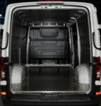 The Crafter’s load compartment, showing the floor and wall liners in aluminium treadplate