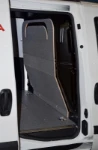 The Doblò’s marble-look plywood bulkhead liner