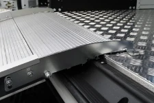 The end of the ramp that rests on the van floor