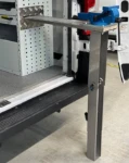 The telescopic support for pull-out vice benches, extended to the ground