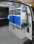 Transparent PMMA drawers, metal drawers and vice holder in a Ford Transit Connect