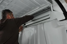 Using the van cab storage unit
