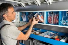 Van racking with transparent plastic containers