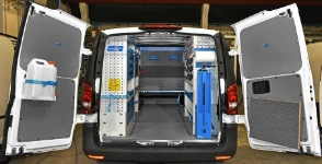 Vito fitted out with shelving on both sides and a central drawer unit
