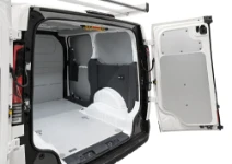 Wooden floor panel and pre-painted sheet-metal panelling for the KIA PV5